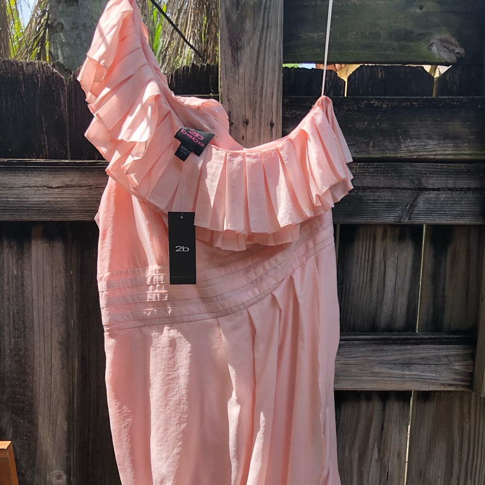 Beautiful asymmetric dress by Bebe